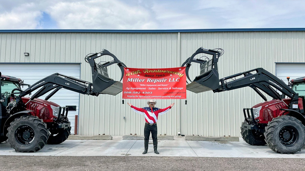 Two Kubota tractors holding Miller Equipment Banner and Buffalo Bill Showcasing it